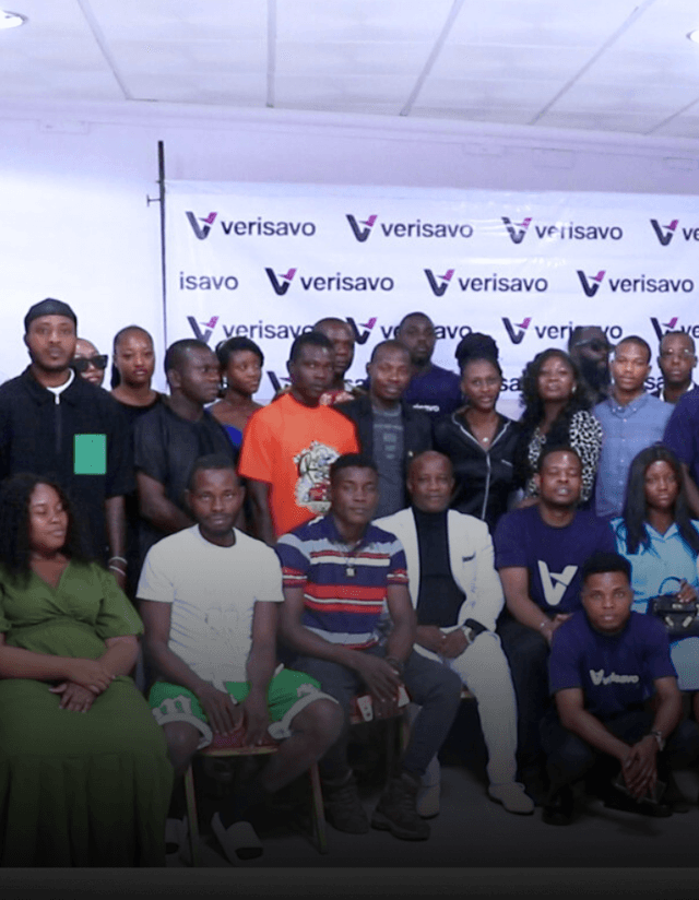 Yellow lights between trees at night